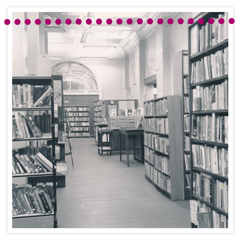 Inside the town centre library, situated on the lower ground floor of The Civic, with its recognisable internal arched windows, 1960s © Barnsley Archives.
